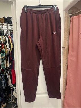 Nike Maroon Jogger Sweatpants with White Swoosh zip bottom